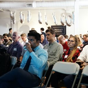 Audience listening to a speaker